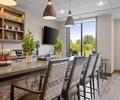 Modern common area with seating and outdoor view