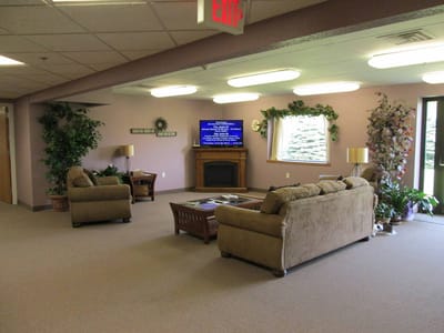 Cozy common area with seating and a television