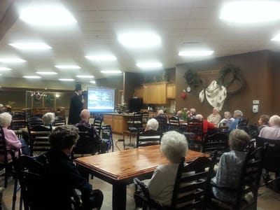 Residents attending a presentation in a common area