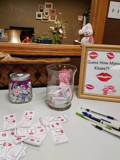 Decorative winter-themed activity station with guessing game