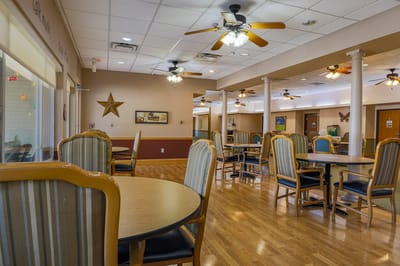 Interior dining area with tables and chairs