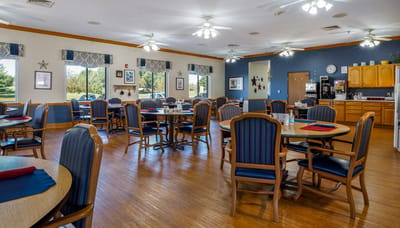 Dining area with tables and seating for residents