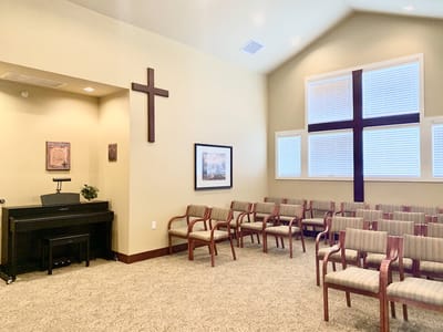Interior view of a serene chapel with seating