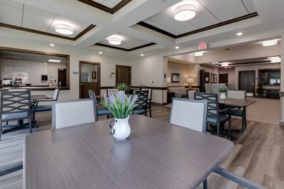 Bright common area with tables and chairs
