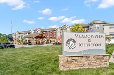 Exterior view of Meadowview of Johnston facility with sign