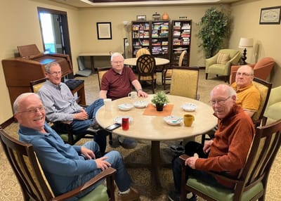 Residents enjoying conversation in a common area