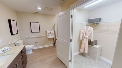 Interior view of a resident's bathroom and closet