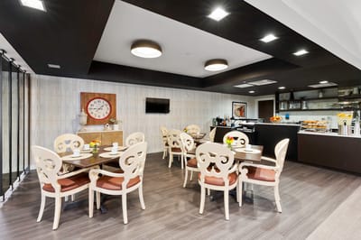 Dining area with elegant tables and food service