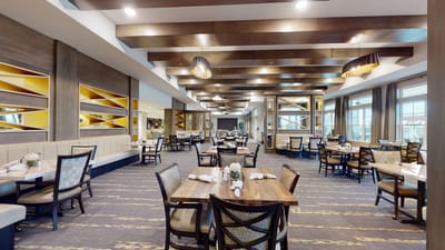 Interior view of a dining room in a senior living facility