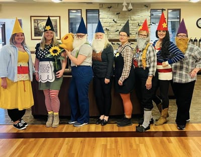 Staff dressed as gnomes in a common area