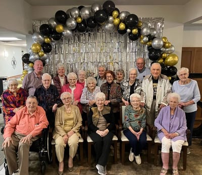 Group of residents celebrating in a common area