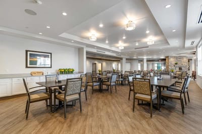 Bright dining room with tables and chairs