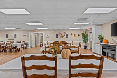 Bright dining area with tables and seasonal decorations