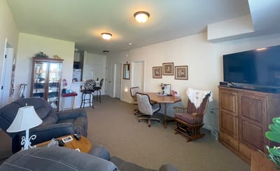 Interior view of a cozy common area with seating