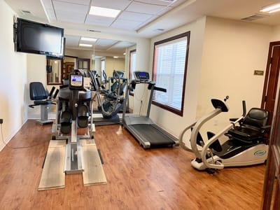 Interior view of a fitness area with exercise equipment
