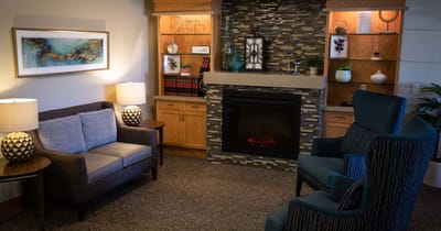 Cozy common area with seating and fireplace
