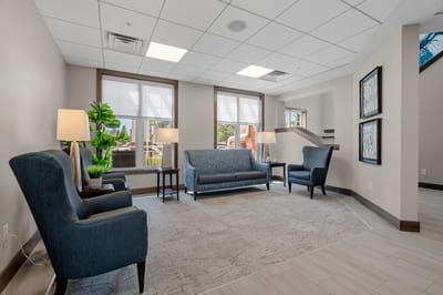 Comfortable lounge area with seating and natural light