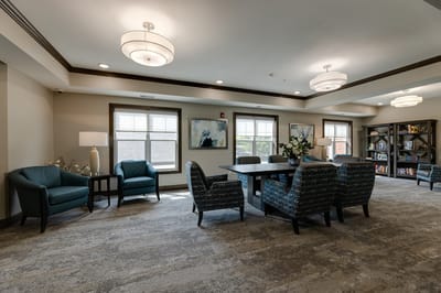 Common area with seating and bookshelves