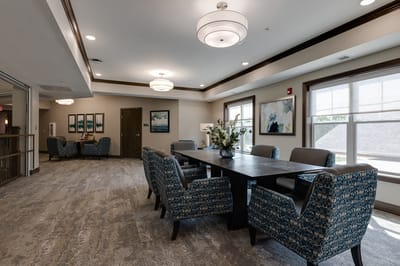 Bright common area with tables and chairs