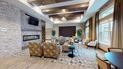Bright common area with comfortable seating and decorative features