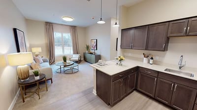 Bright and spacious interior living area with kitchen