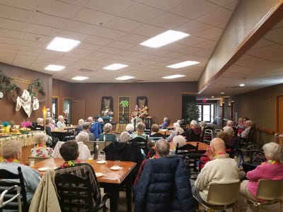 Residents enjoying a live performance in a common area