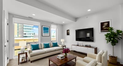 Bright common area with seating and artwork