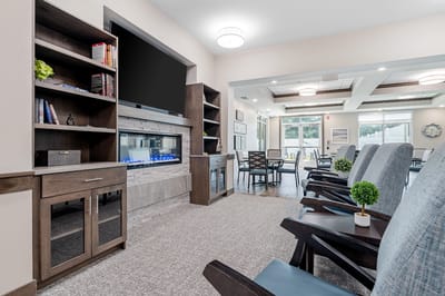 Common area with seating and a fireplace