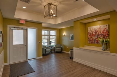 Bright interior common area with seating and art