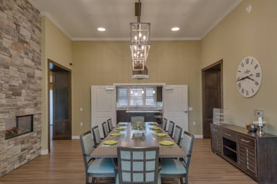 Dining area with large table and modern decor