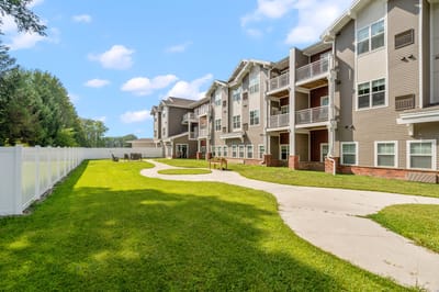 Outdoor space with building and walking path