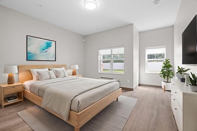 Bright, spacious bedroom with modern furnishings