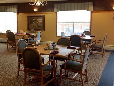 Dining area with multiple tables and chairs