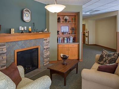 Cozy common area with a fireplace and seating
