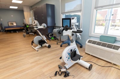 Rehabilitation gym with exercise equipment for residents
