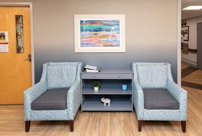 Comfortable seating area with artwork in a common room
