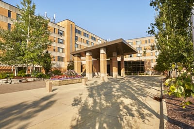 Exterior view of Meth Wick Community with landscaping