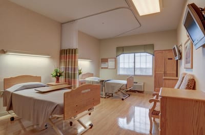 Interior view of a shared resident room with two beds