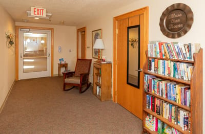 Interior hallway showing bookshelves and seating