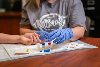 Healthcare staff providing care to a resident