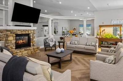 Cozy common area with comfortable seating and a fireplace