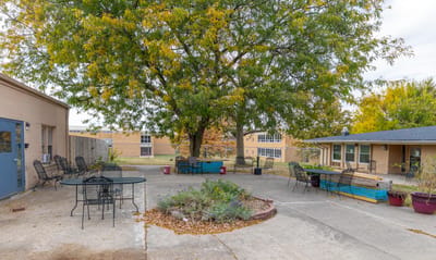 Outdoor space with seating and trees