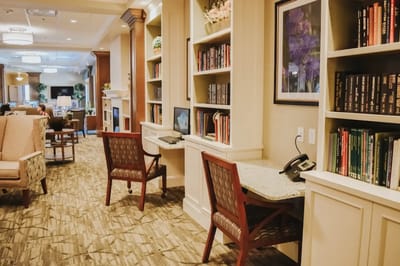 Interior common area with bookshelves and seating