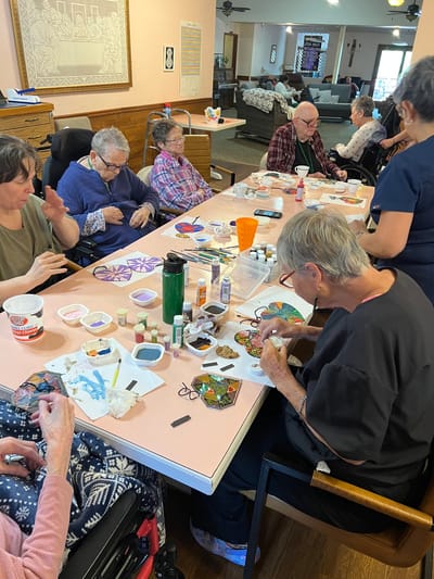 Residents engaging in a creative arts activity
