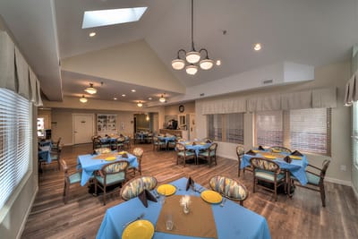 Dining area with tables set for a meal