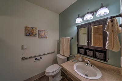 A clean, well-lit bathroom in a senior living facility