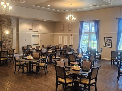 Dining area with tables and chairs arranged