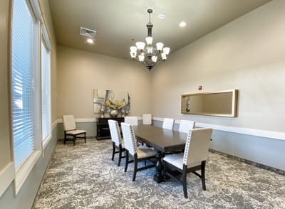 Interior view of a dining area with a table and chairs