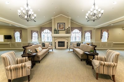 Common area with seating and fireplace