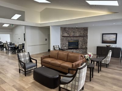 Common area with seating and a fireplace